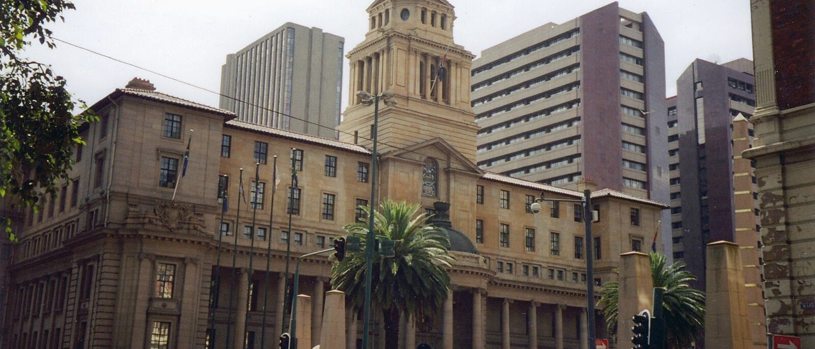 The Johannesburg City Hall on Market Street, a classical stone civic building with a domed tower.